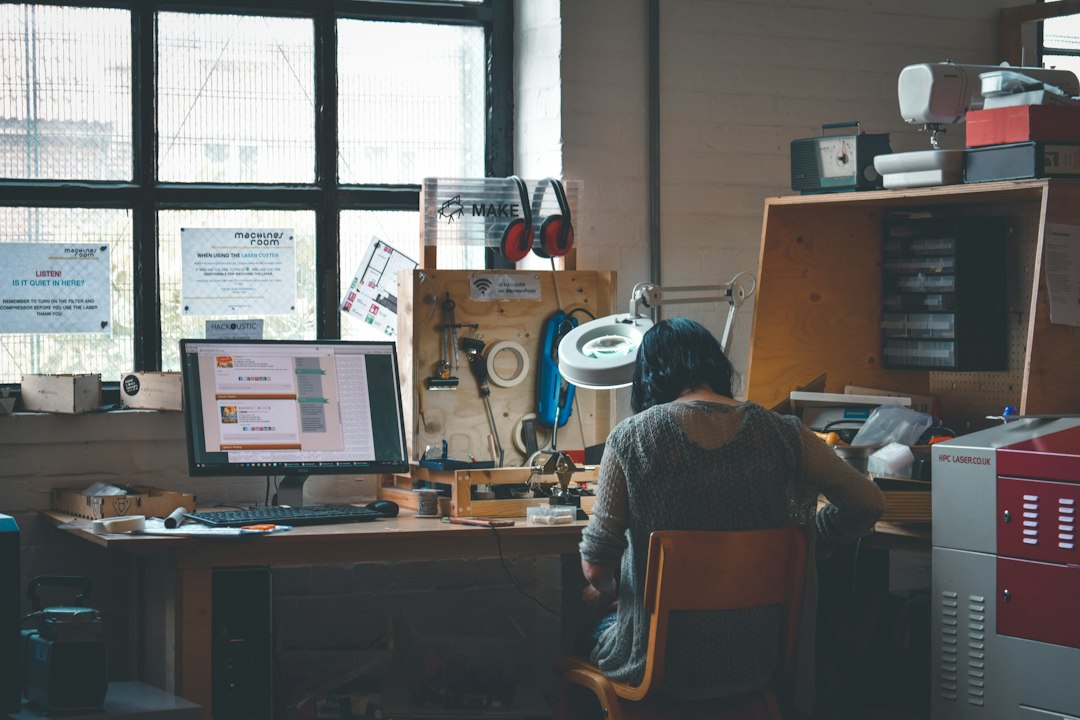 Designer working at a desk in an architecture studio