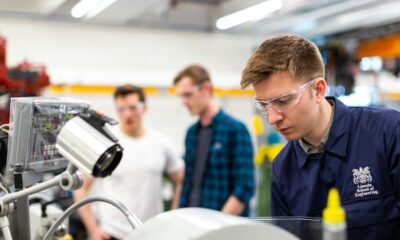 Engineering maintenance technician working with industrial machinery