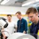 Engineering maintenance technician working with industrial machinery