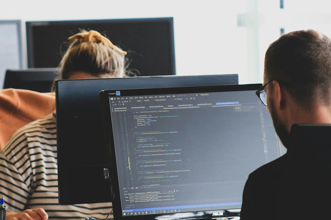 Software testing and QA professionals working with computers