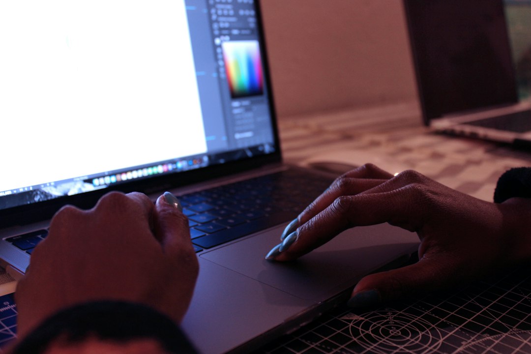 UX and UI designer working on a computer